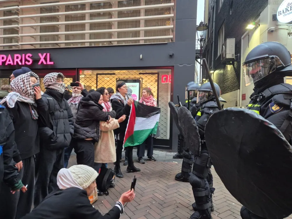 Dozens of protesters defying the ban were detained in Amsterdam